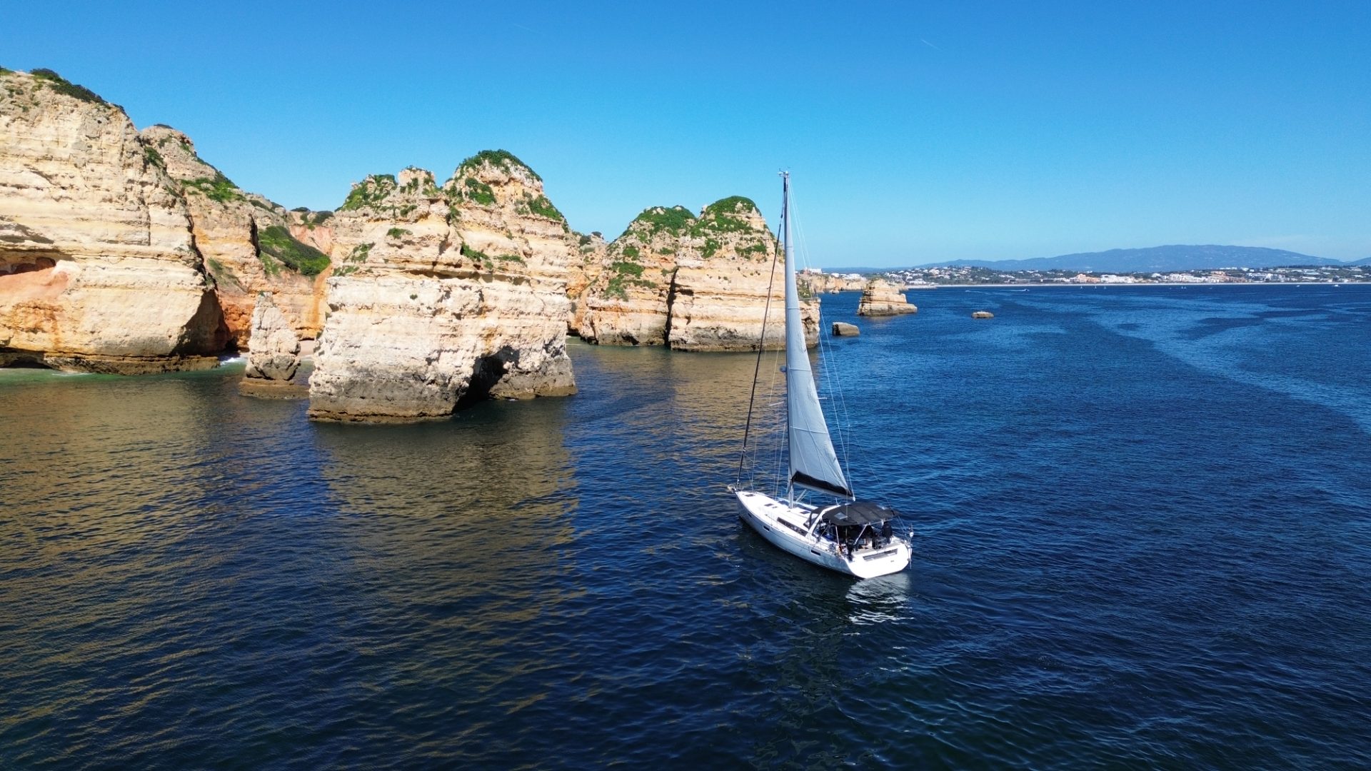 Sailing past the cliffs